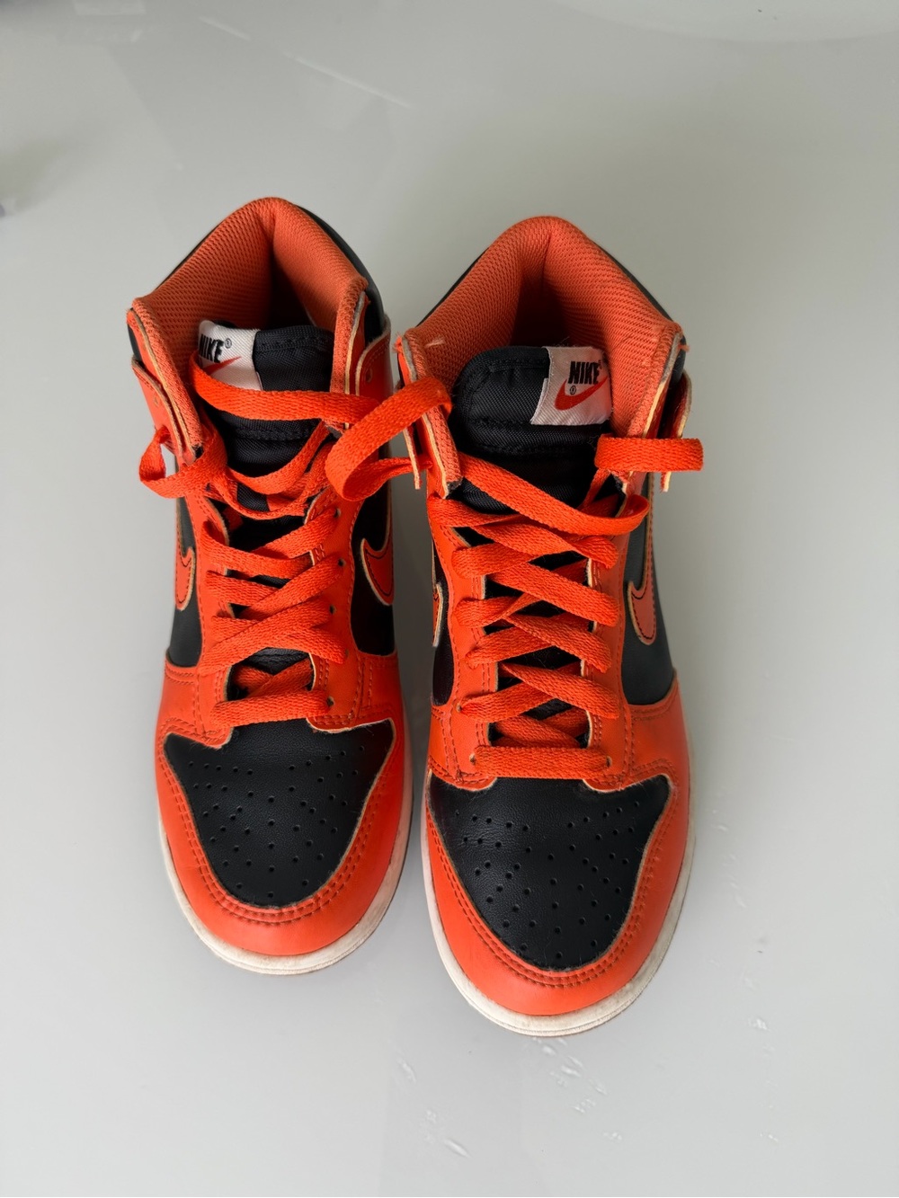 Nike Kids Orange and Black High-Top Sneakers with Swoosh